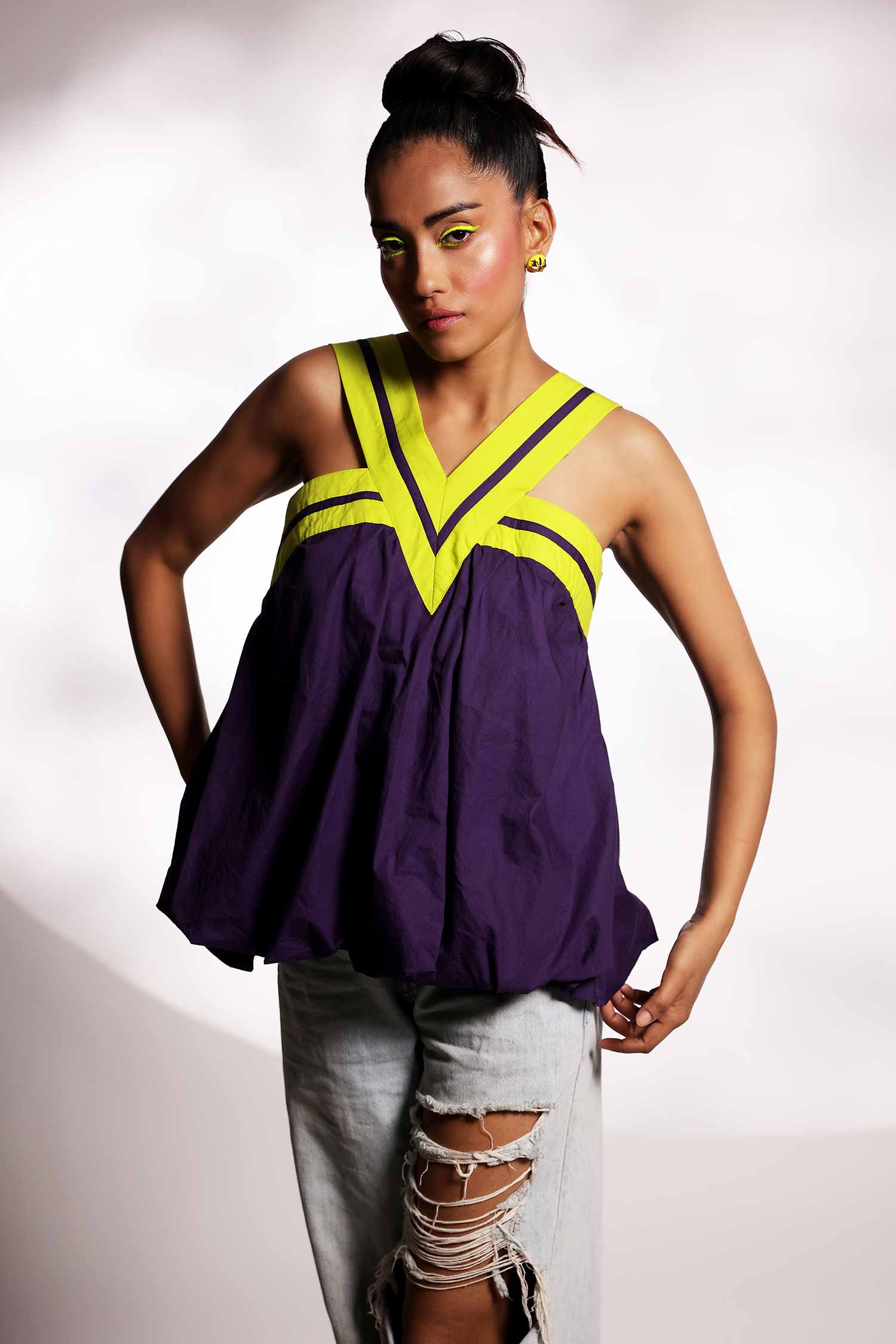 Violet balloon top with lime green V strap