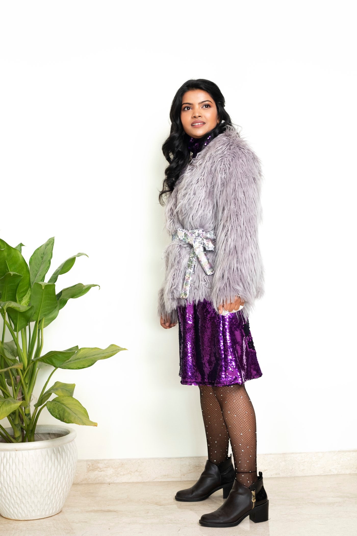 Sania Chadha In Lavender fur jacket with sequin belt