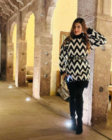 Shradha Manaktala In Black and white dress with fur neck, edge and sleeve